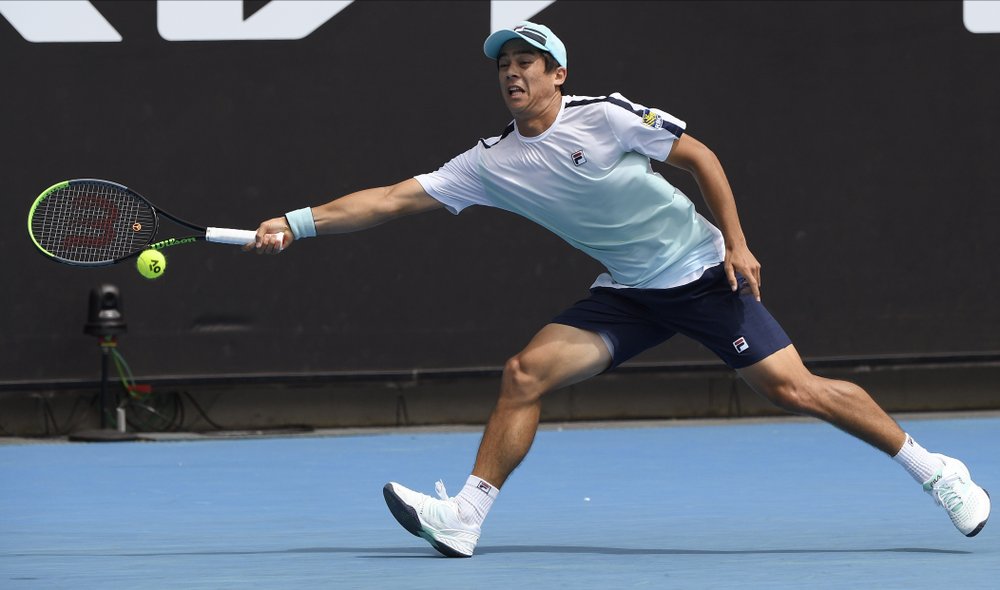 The Latest: American McDonald advances at Australian Open