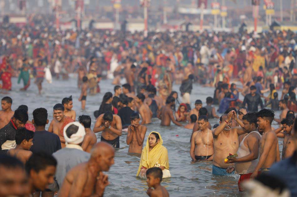 Hindu festival draws crowds of bathers to rivers