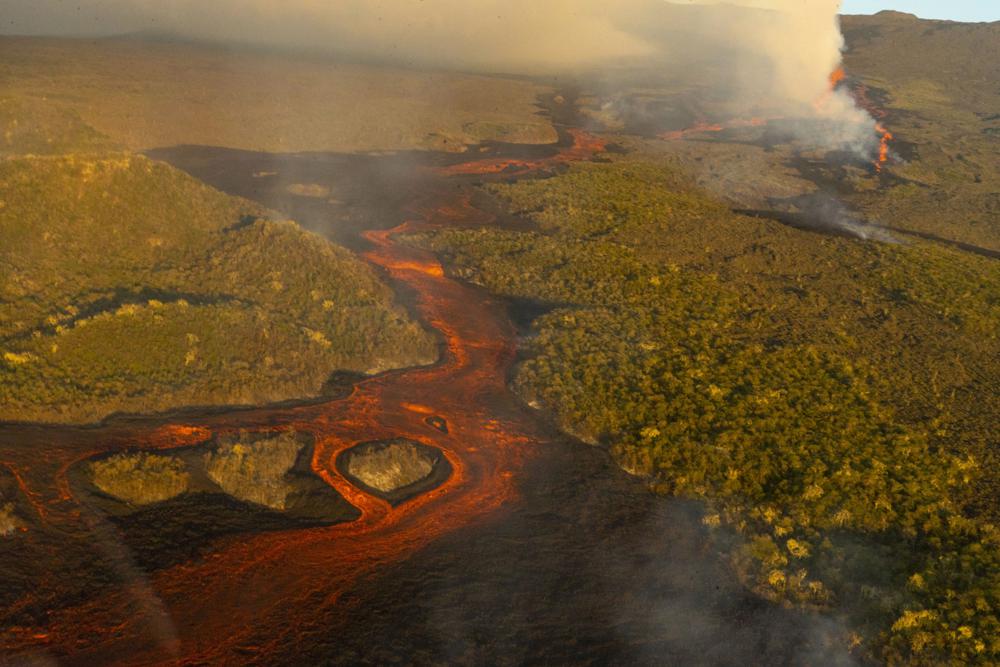 Tallest Galapagos volcano erupts, spews lava