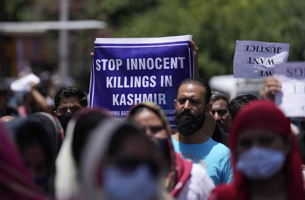 Hindu banker and a worker from India fatally shot in Kashmir