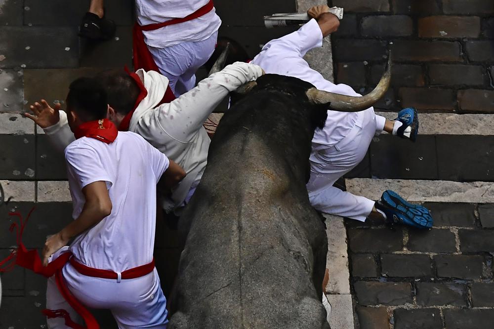 2 men gored while running with bulls at Pamplona festival