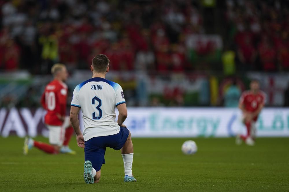 World Cup: England and Wales take a knee