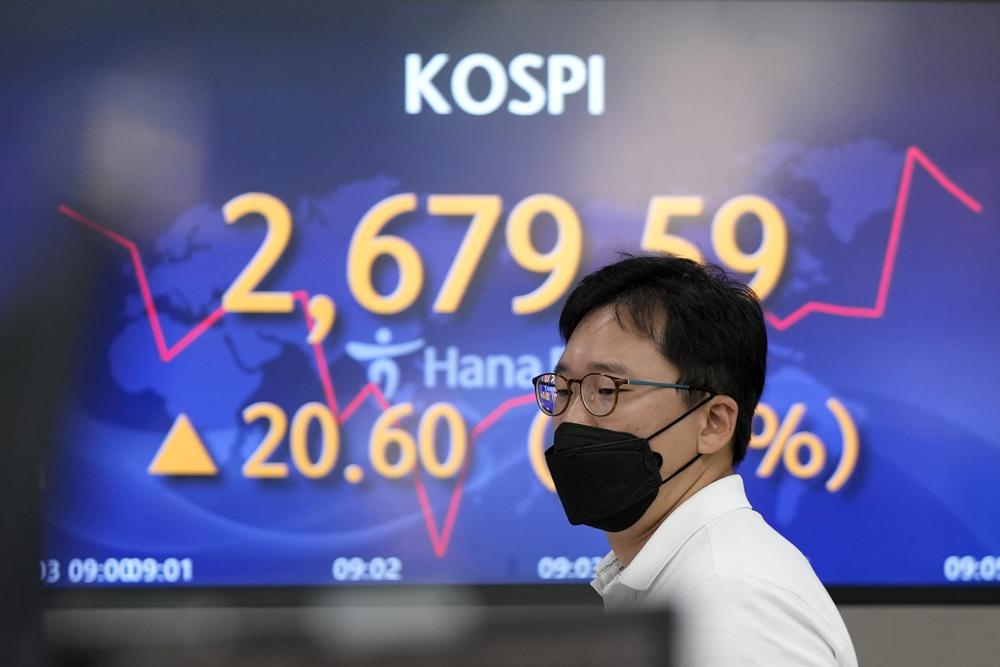 Asian shares rise, China trading closed for national holiday