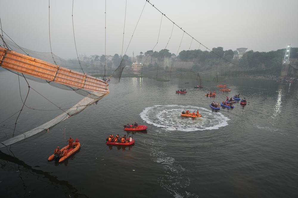 Nine arrested after bridge collapses in India, killing 134