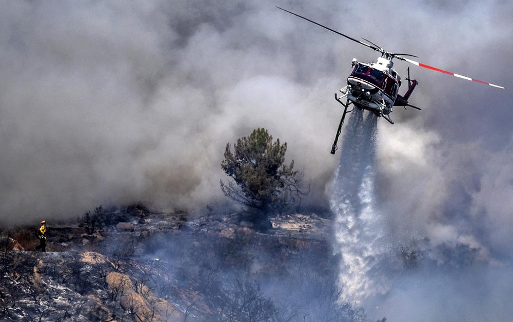 Lake Tahoe threatened by massive fire, more ordered to flee