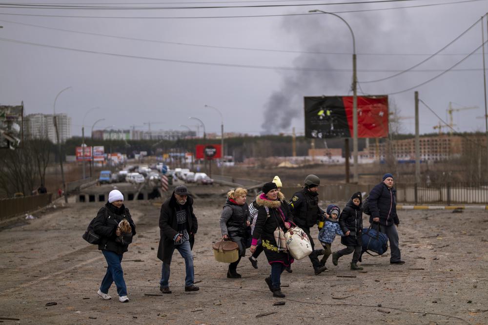 People flee embattled Ukrainian cities along safe corridors