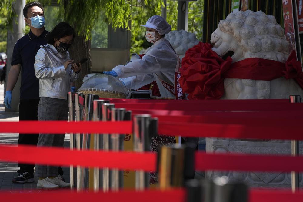 Shanghai will try to ease 7-week virus lockdown in few days