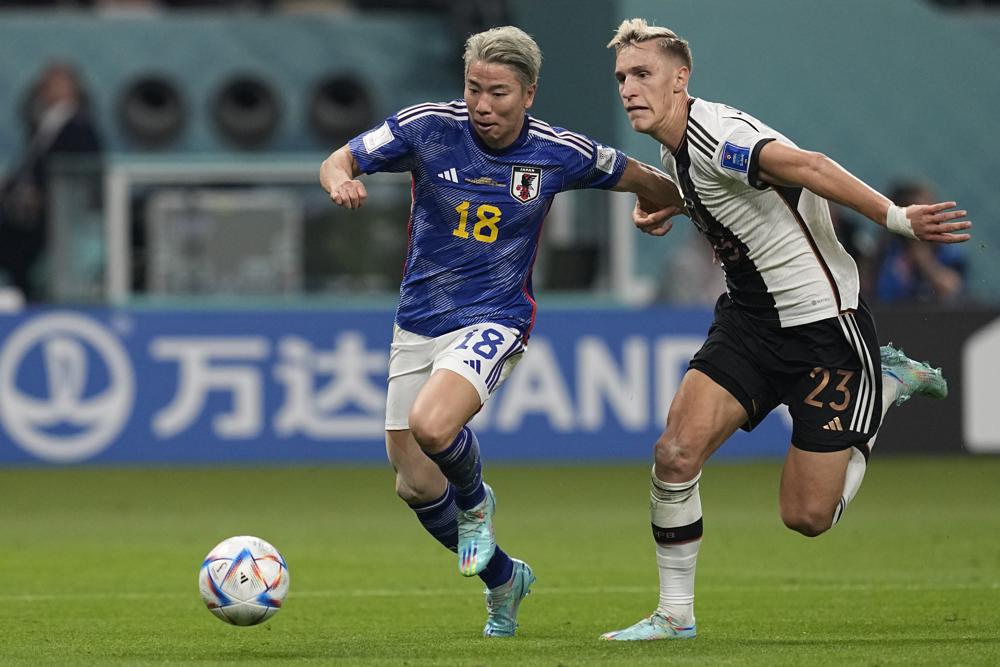 Japan gets 2 late goals to beat Germany 2-1 at World Cup