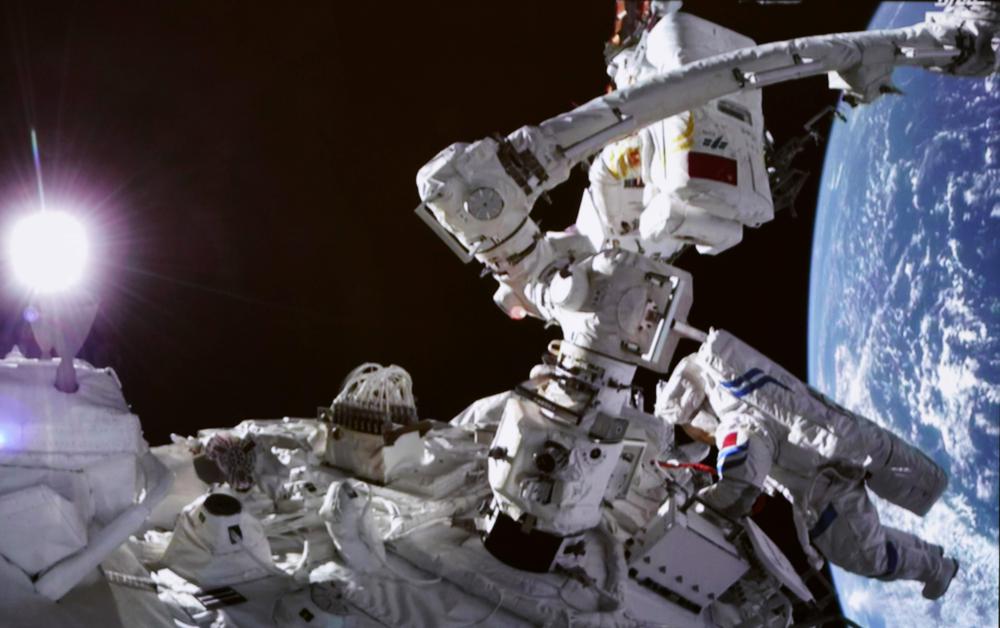 Chinese astronauts go on spacewalk from new station