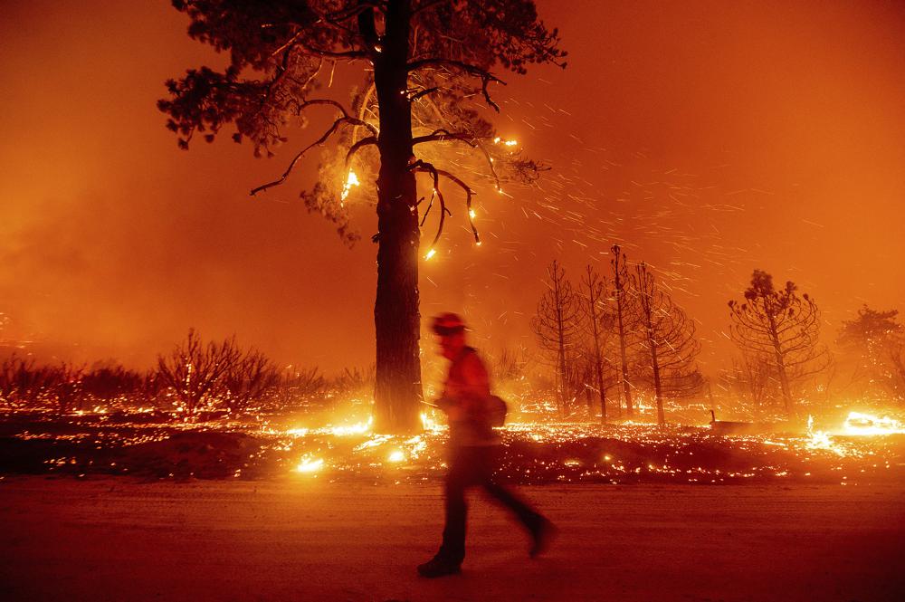 EXPLAINER: Why it takes months to subdue some wildfires