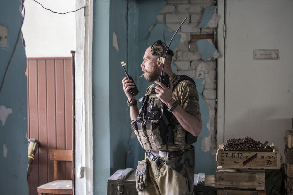 Civilians flee intense fighting in contested eastern Ukraine