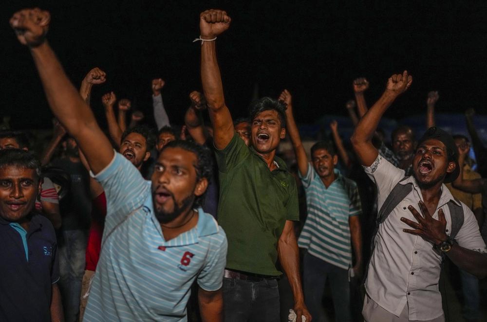 Protesters retreat as Sri Lankan president sends resignation