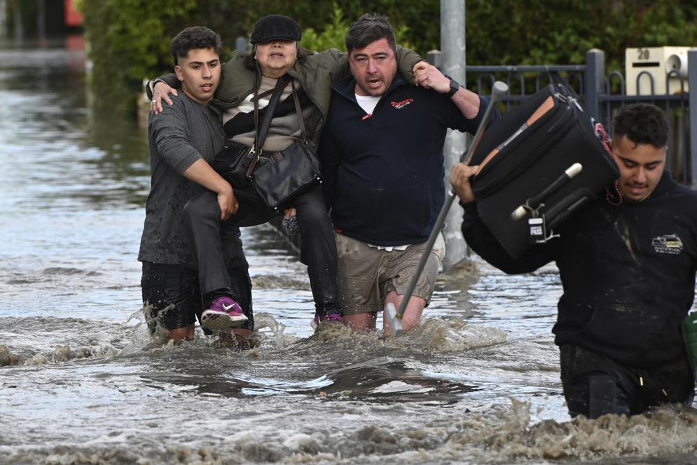 Homes inundated by swollen rivers in Australian floods