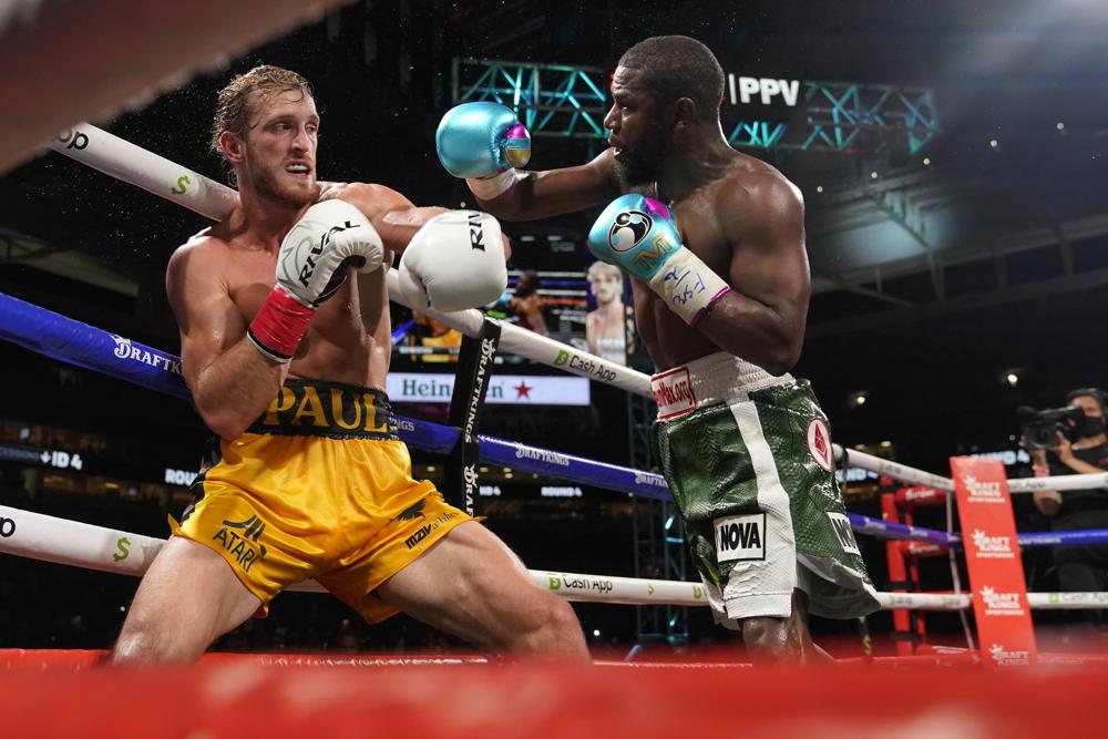 Paul lasts the distance against Mayweather in exhibition