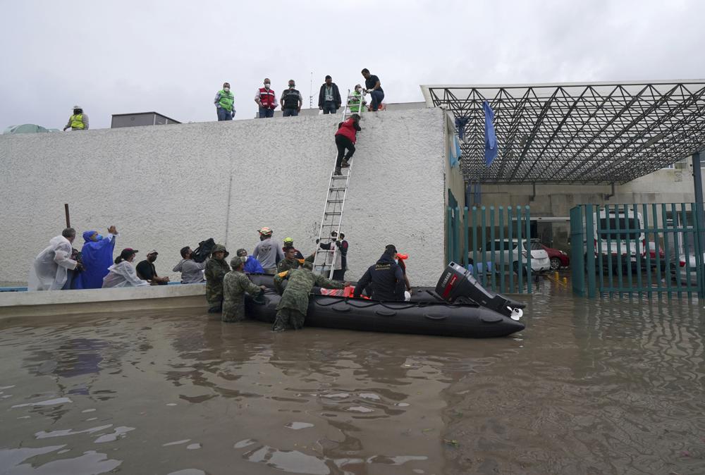 16 die as floods swamp public hospital in central Mexico