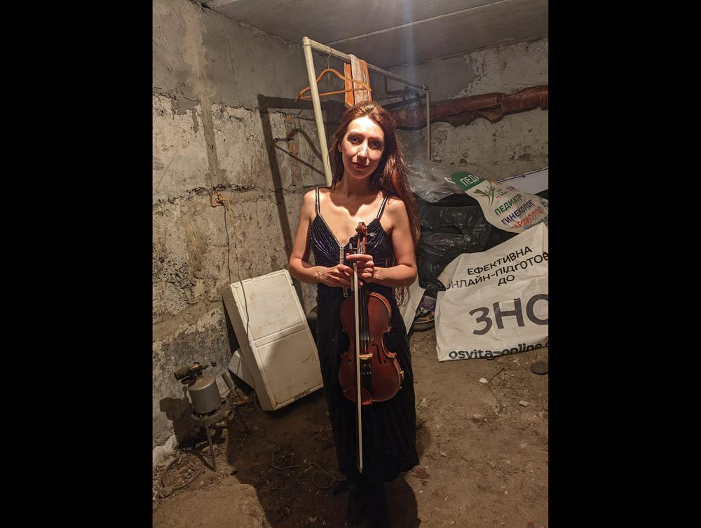 Sheltering from bombs, Ukraine’s ‘cellar violinist’ plays on