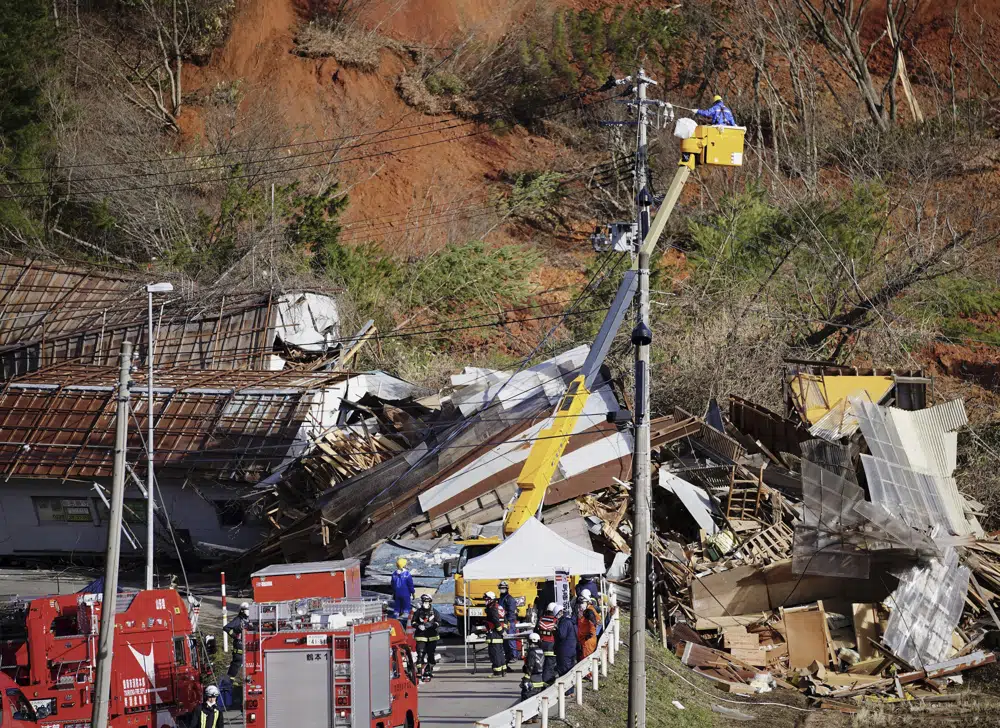 Troops join search for missing in northern Japan landslide