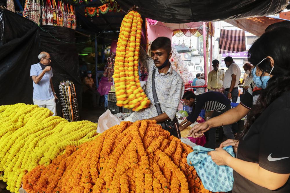 People celebrating Diwali across Asia