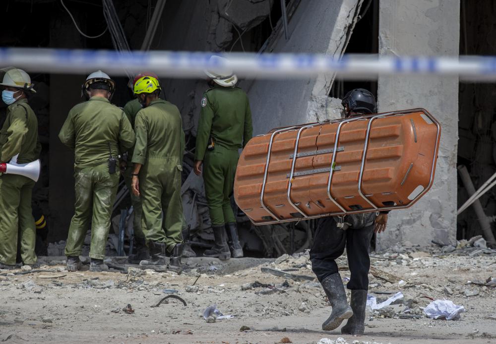 Havana hotel death toll at 30 as dogs search for survivors