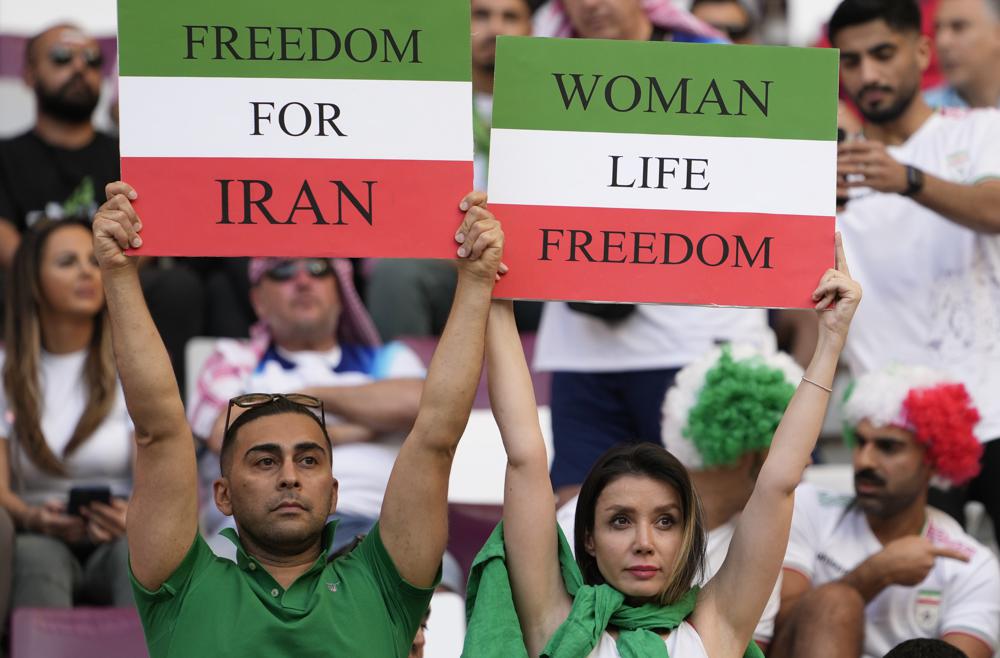 Barred from stadiums at home, Iran women travel to World Cup