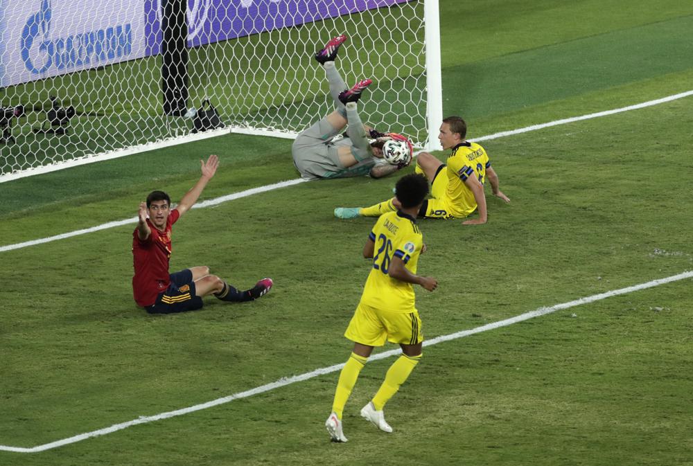 Spain upset about field conditions in Seville