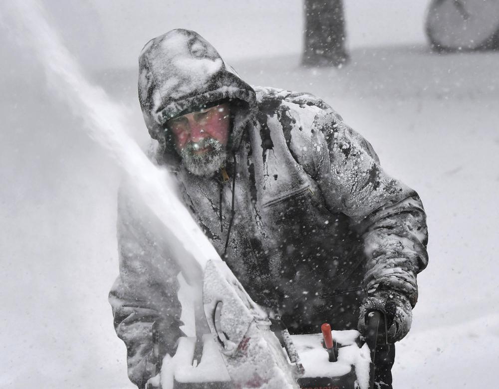 Blizzard buffets East Coast with deep snow, winds, flooding