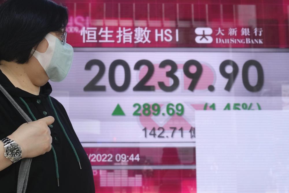 World shares advance despite losses on Wall Street