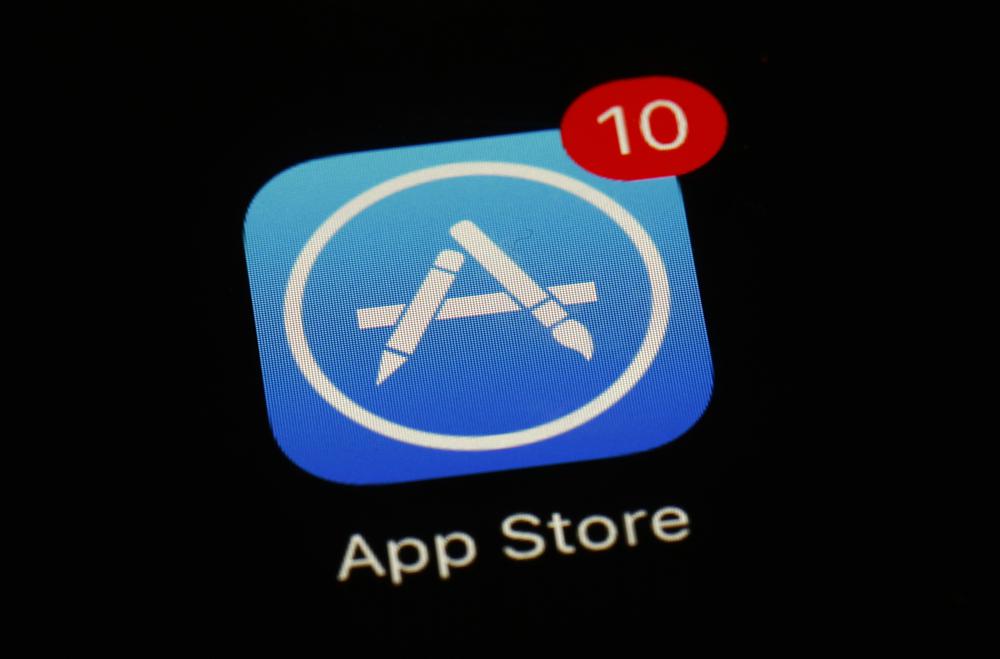 Apple loosens app store payment rules in lawsuit settlement