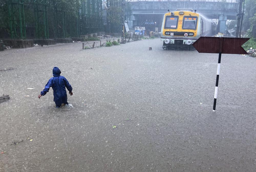 Landslides in western India kill 5, while floods trap more