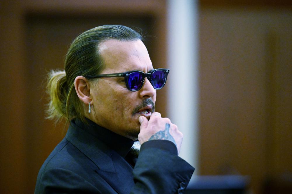 Johnny Depp back on the stand in lawsuit against Amber Heard