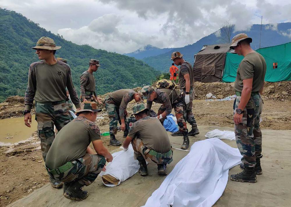 Rescuers recover 26 dead from mudslide in India’s northeast