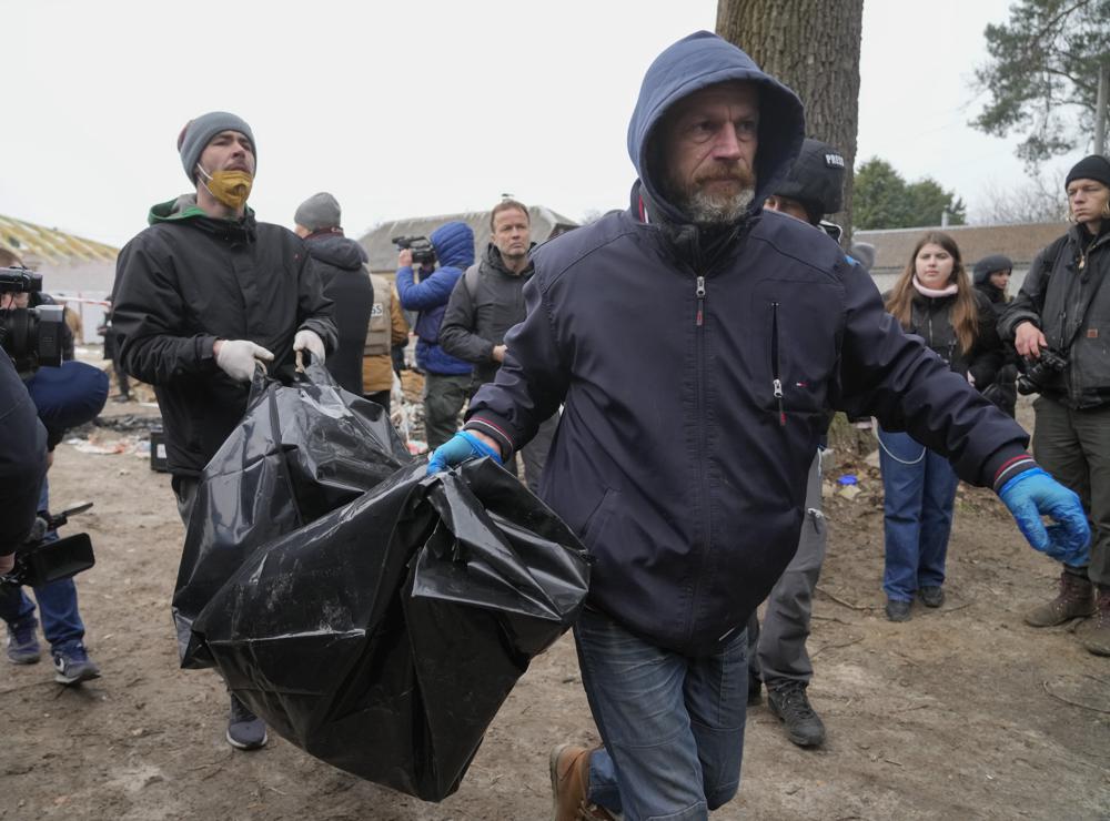 In Bucha, Ukraine, burned, piled bodies