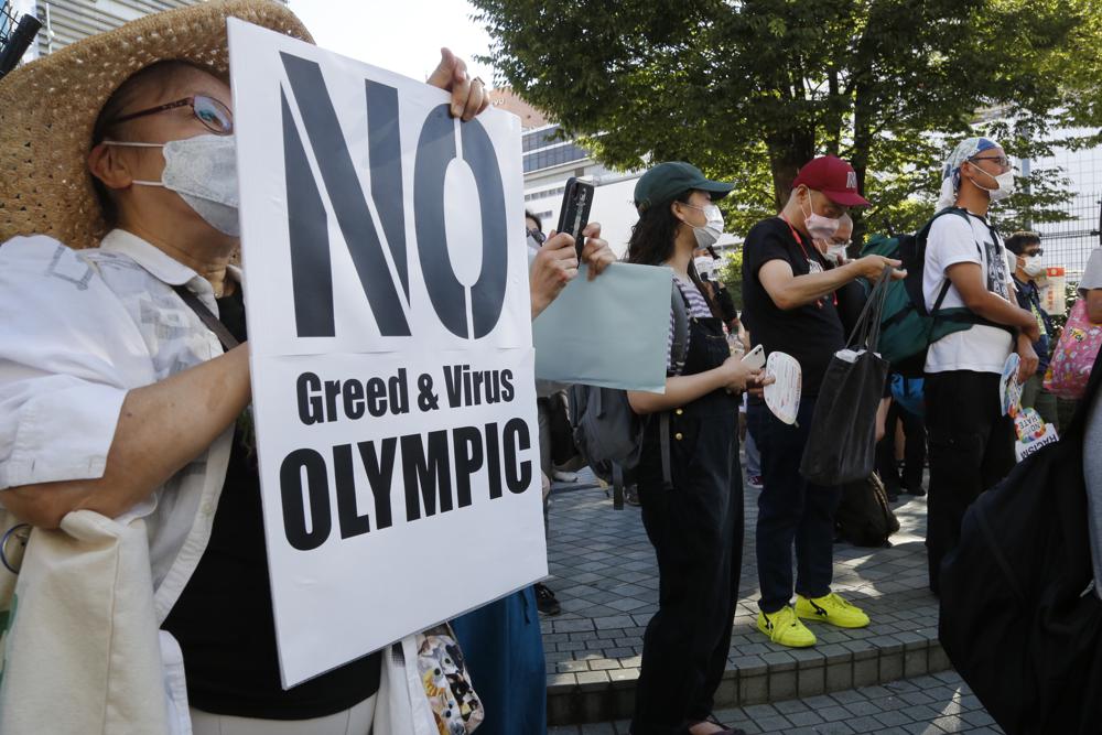 Virus cases test Olympic organizers’ assurances