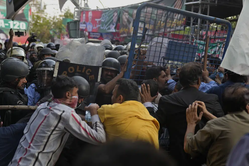 Clashes erupt as police try to arrest Imran Khan