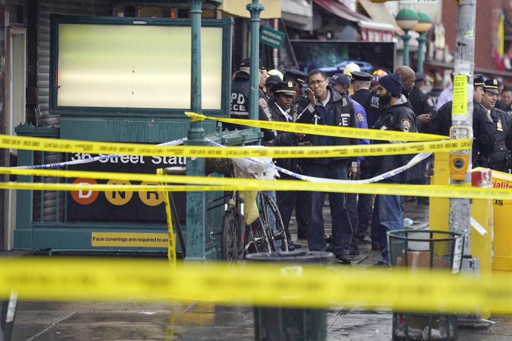 Police hunt gunman who wounded 10 in Brooklyn subway