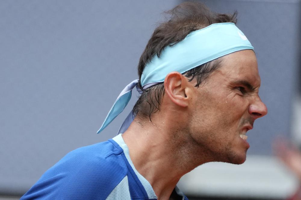 Nadal returns from injury with straight-set win