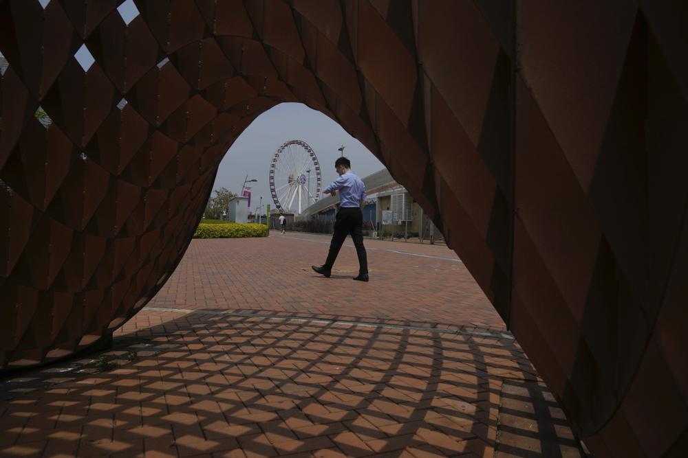 Hong Kong reopens beaches, Beijing relaxes quarantine