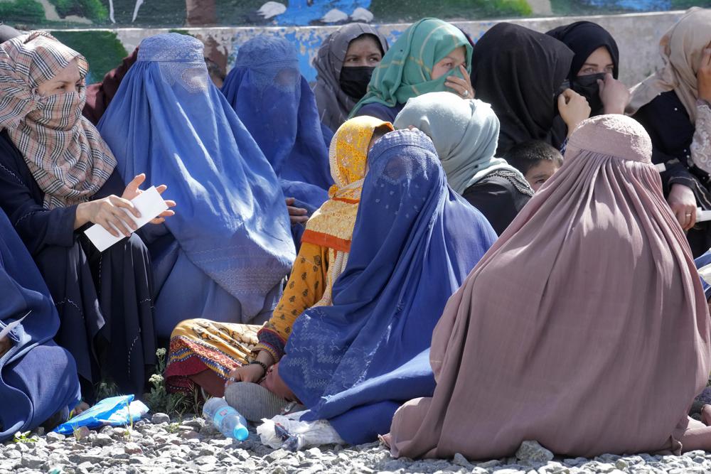 Afghanistan’s Taliban order women to cover up