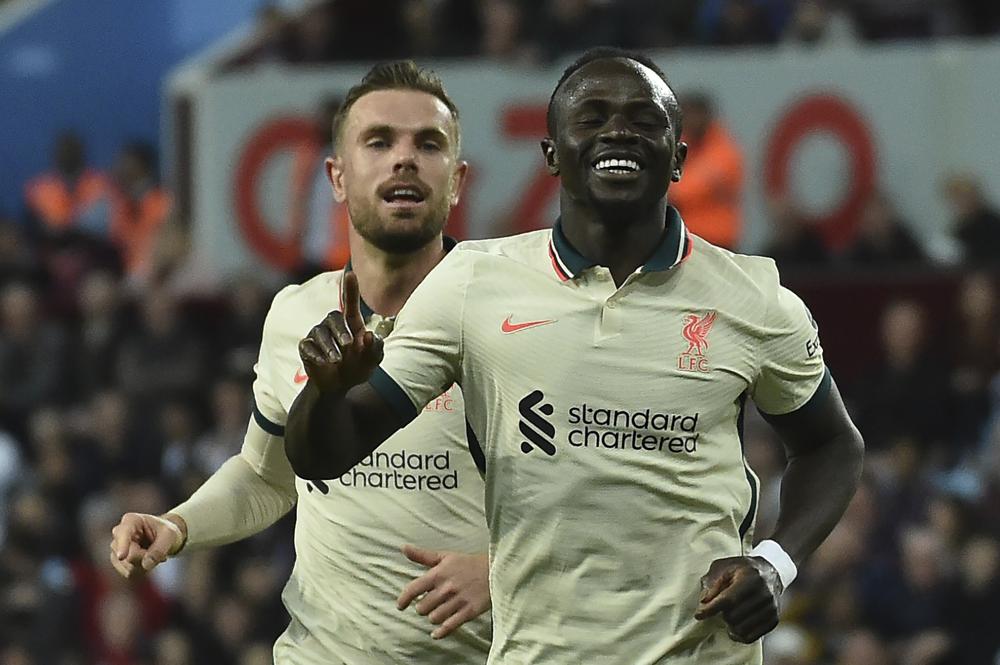 Liverpool beats Villa 2-1, level on points with City