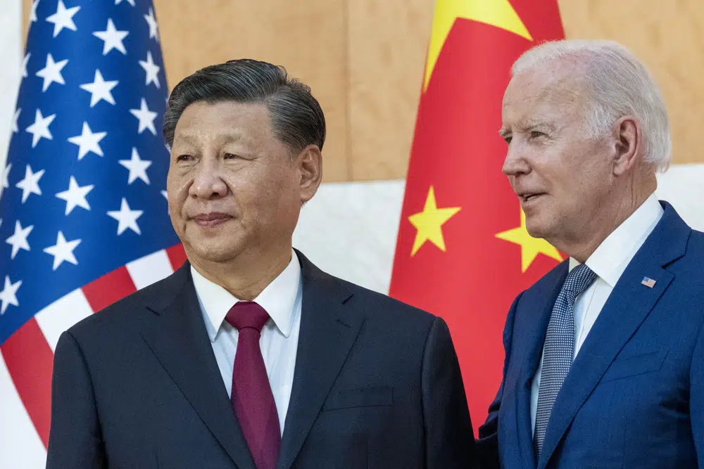 China accuses Washington of trying to block its development