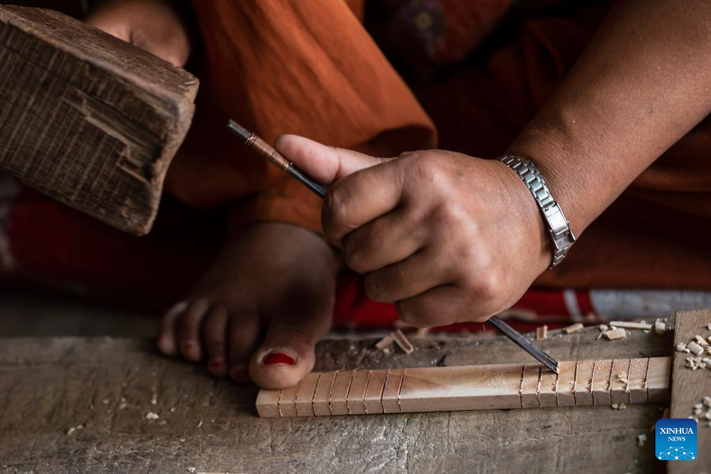 In pics: wood carving in Lalitpur, Nepal