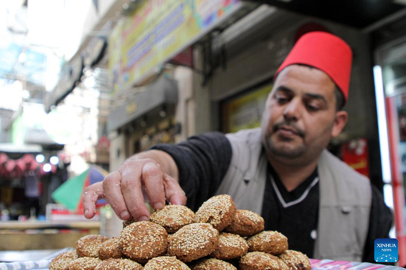 Vendors sell food at local market during Ramadan in Gaza City