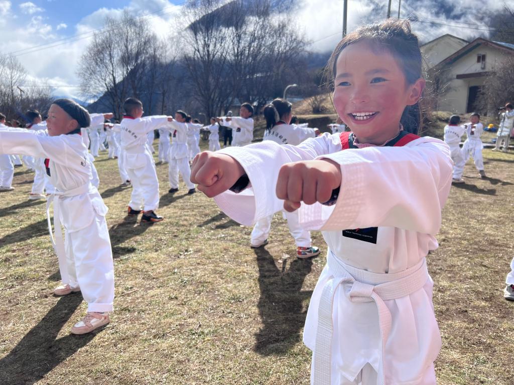 Teenagers in Tibet attend taekwondo camp