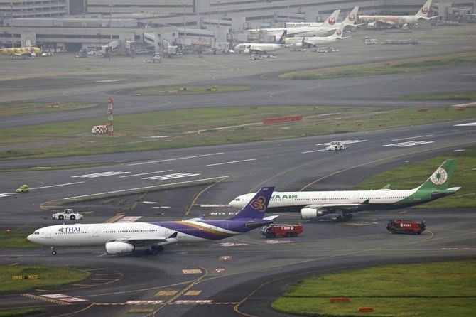 2 planes collide at Tokyo’s Haneda airport