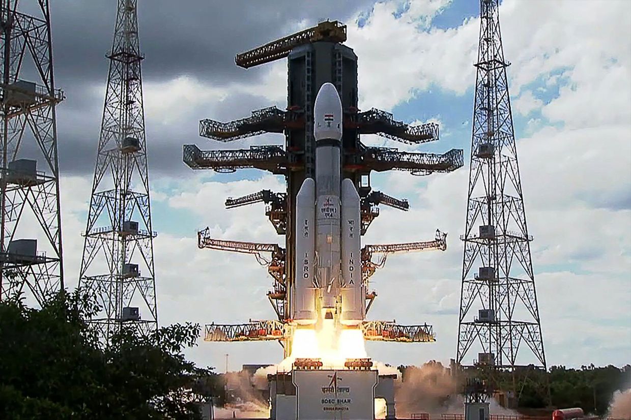 India launches rocket to land spacecraft on Moon