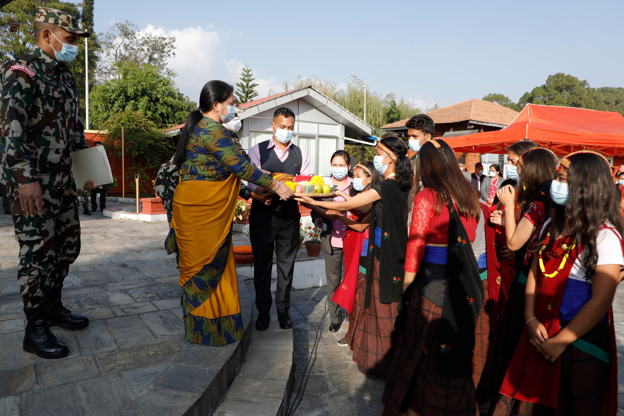 NCO children perform deusi bhailo at Office of President