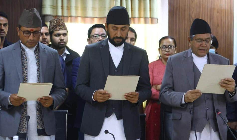 Rabi Lamichhane and Dr. Swarnim Wagle take their oath