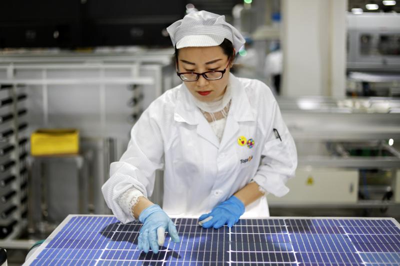 Biden’s solar ambitions collide with China labor