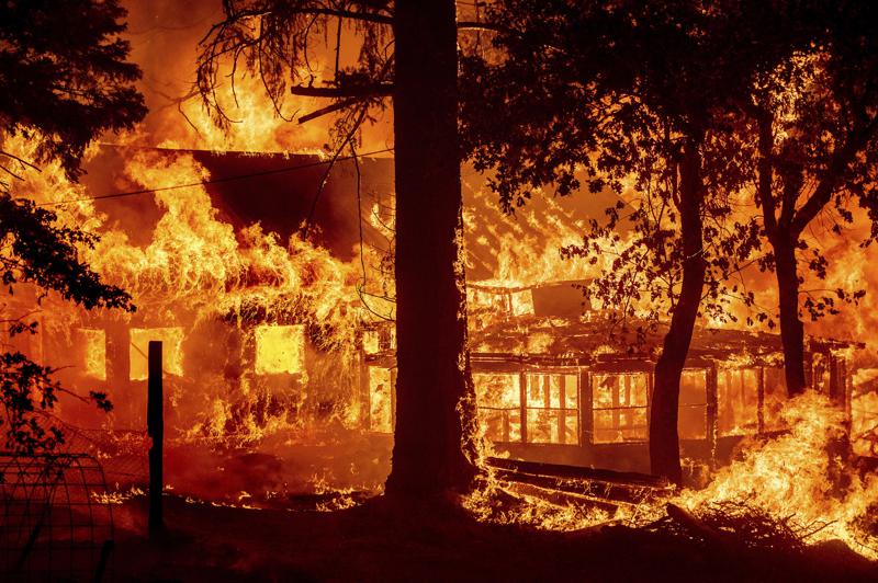 California’s largest fire torches homes as blazes lash West