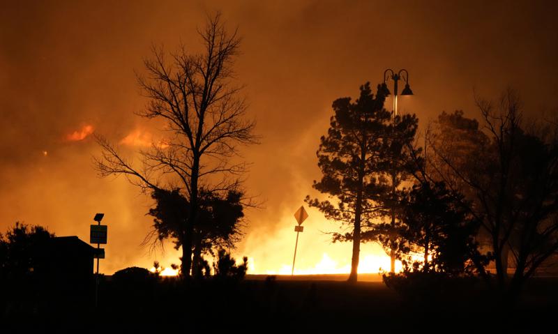 Colorado wildfires burn hundreds of homes